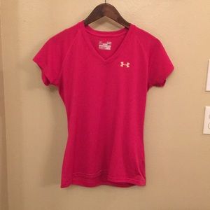 Women's semi fitted heat gear under armour shirt.